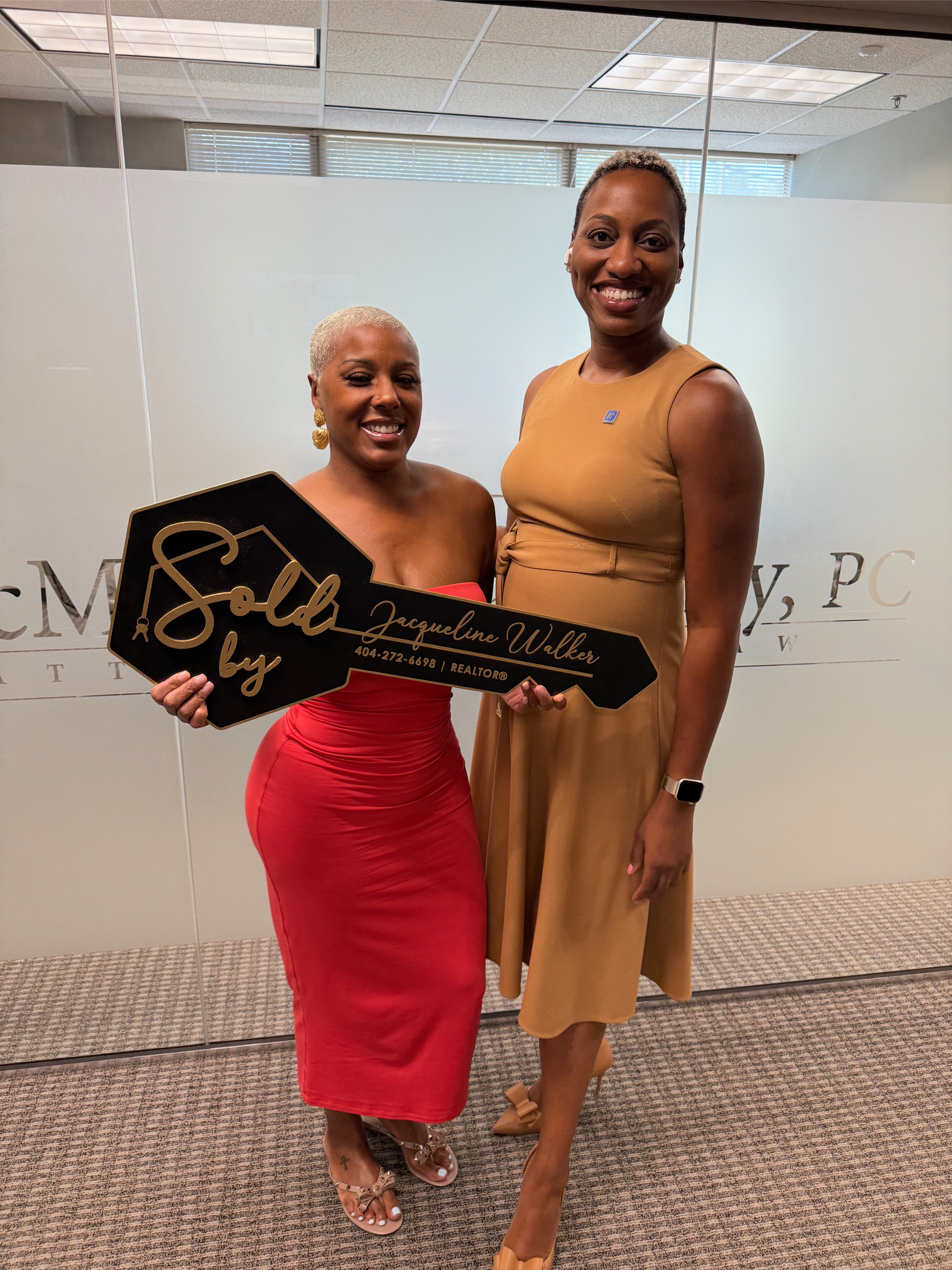 Jacqueline Walker with a recent seller at the closing table — Sold by Jacqueline Walker.