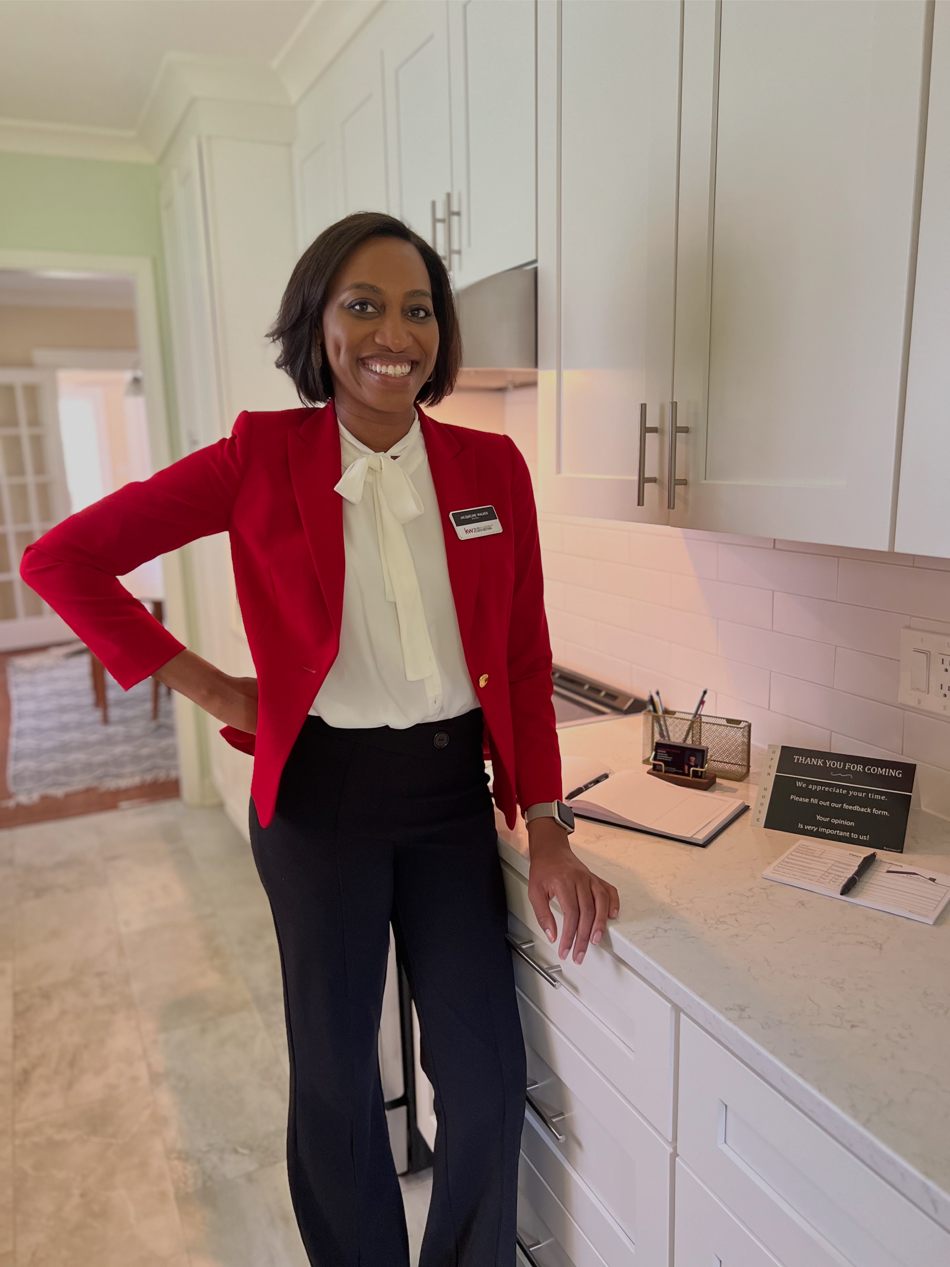 Jacqueline Walker, REALTOR®, hosting an open house at one of her Atlanta listings.
